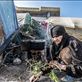 DISPLACED SYRIAN OLD WOMEN COOKING SOUP AROUND A CAMPFIRE IN BAB ALHWA CAMP FOR  by: ealsinan Views[601]