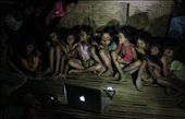 A Matigsalug tribe kids enjoying the show prepared by my friend. Seems like it's their first time watching a movie. There's no electricity and phone signal in this area. : by earlryanj, Views[1420]