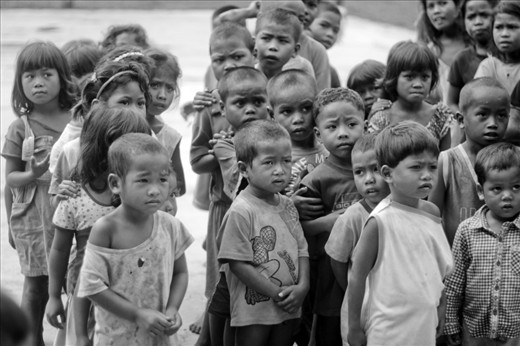 A curious faces of grade schoolers. they were gathered by their parents to recieve their gift, they were not sure what we were going to do since we have different dialects, they didn't understand what we were saying. only some of thier parents knows our dialect.   