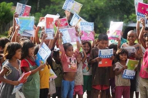 Happy faces after receiving their schoolkit gift. After this event I realized that we may have different languages, dialects, colors, beliefs etc. as long as we are united and connected we are the same and equal coz we share the same true religion and language called Love. Im happy doing this as much as I love traveling and photography.