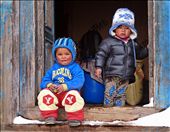Kids watching the front of their house, while parents are working at the back of the house.: by easternlands, Views[583]