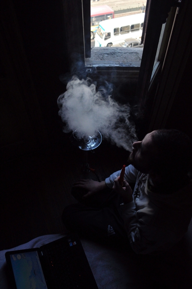  Through the walls of social media however, George comes off as forthcoming and gregarious. Constantly engaged in online conversations, he spends a large majority of time in bed. With a now apathetic nature, George never exhibits an interest in the recent protests in Egypt. In fact, in order to eschew