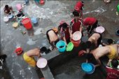 China. Henan province. Dengfeng city. Shaolin Tagou Martial Arts School. Young students washing their tracksuits in the courtyard of the school.: by edoardolucci, Views[835]