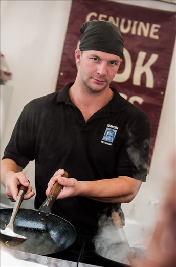 # Catches the Eye

At the Huddersfield Food & Drink Festival a stall holder pauses whilst preparing his food, giving the camera a good eyeball.
