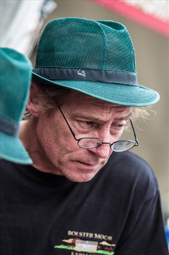 # Listening Closely

At the Huddersfield Food & Drink Festival some of the finest local producers congregate. Here a master butcher listens closely to a customer as they order.