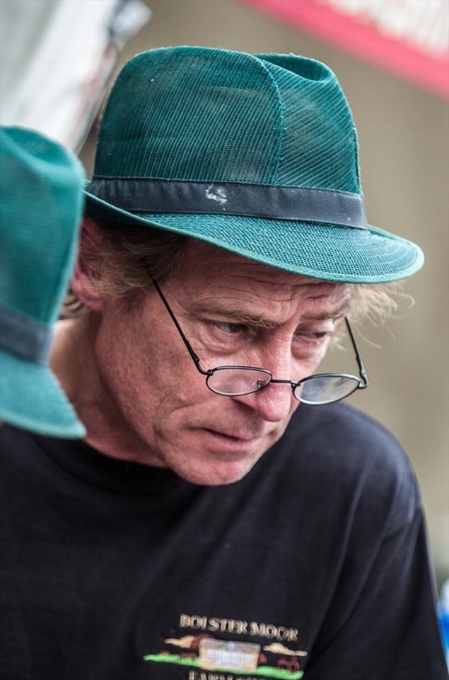 # Listening Closely

At the Huddersfield Food & Drink Festival some of the finest local producers congregate. Here a master butcher listens closely to a customer as they order.