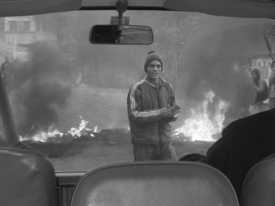 As we arrived in Kathmandu, the city was grinding to a halt under the strain of widespread protests over petrol price hikes. I captured this protester as our concerned driver tried to navigate the maze of closed roads and fire barricades. The relaxed face of the protestor contrasts with the urgency of the scene, and tells the story of an impoverished city in which protests are all too commonplace. Moments later our car was ordered to turn around. 