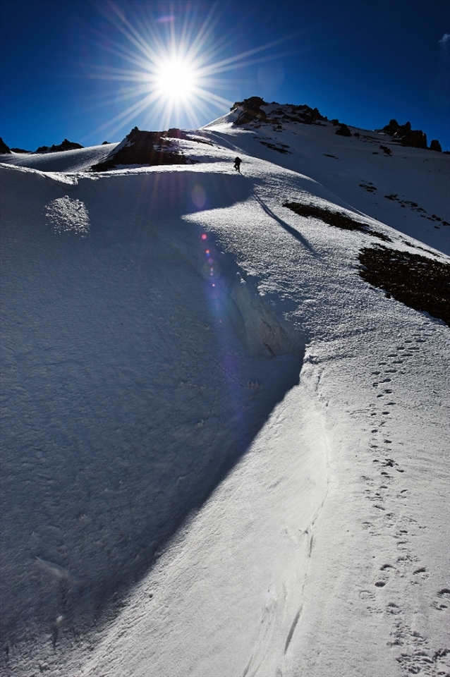 Maxim, a friend of mine, ascending the glacier of Peak Sovetov. Peak Sovetov is a peak of Tyan Shan mountain range, approx. altitude of 4378 metres.