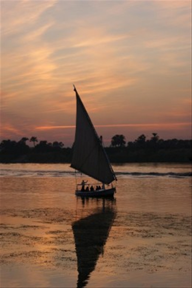 Returning from a hard day of labour through the Nile River.