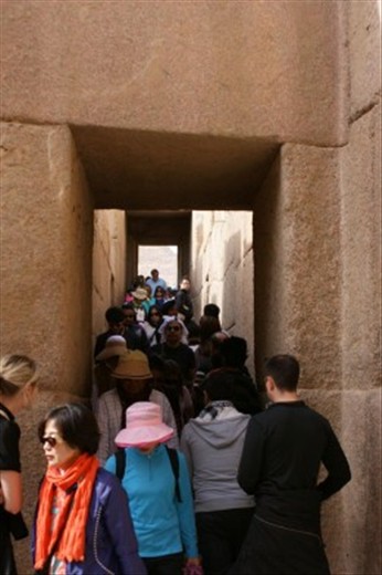 Ancient hallways once filled with tourists, now remain empty.