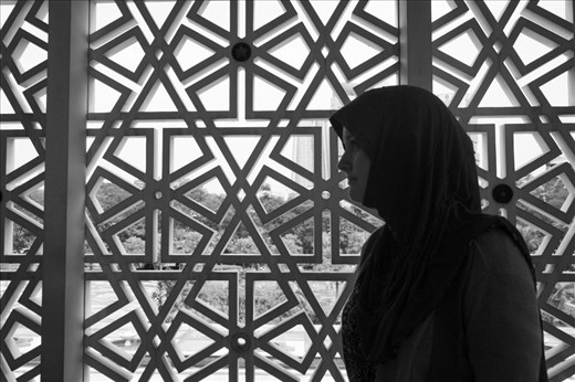 Regardless of religious background, every female who enters the National Mosque must be totally covered except for her hands, feet, and face. 