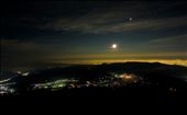 Japanese people start the climb at nightfall to reach the summit for sunrise.  Here, you can see the moon rising over the city of Fujiyoshida.: by elisemesa, Views[441]