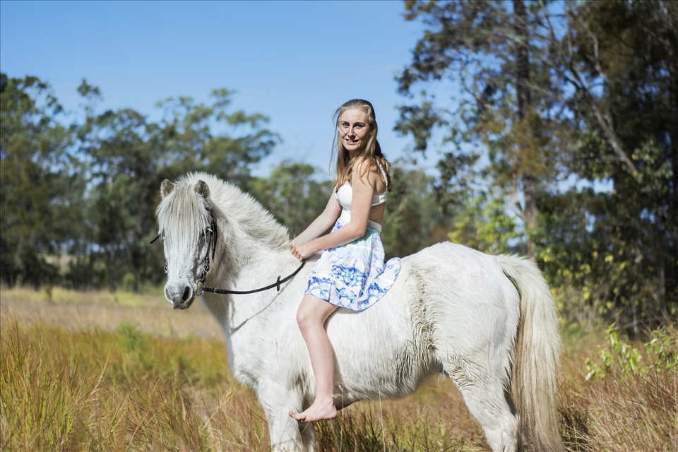 My best friend and her pony Butch.