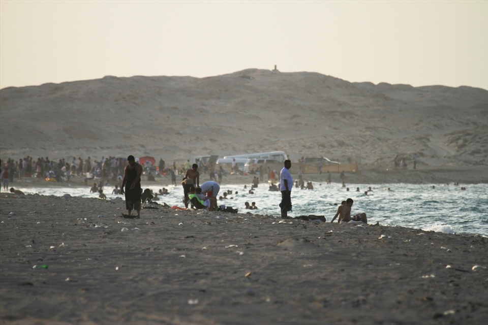 Fuwairit beach, northern Qatar: During spring, dozens of female hawksbill turtles emerge from the sea and onto this beach to lay their eggs in the sand. Now about two months later the beach, one of the most popular weekend getaways in Qatar, is at it’s busiest. Despite the masses of people, jet-skis and BBQs, the nests are fine. They have been re-located to a safe zone by a group of dedicated volunteer turtle rangers. 