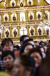 Inside the Church of St. Niño, the very altar inside with hundreds of devotees.: by eluzion, Views[258]