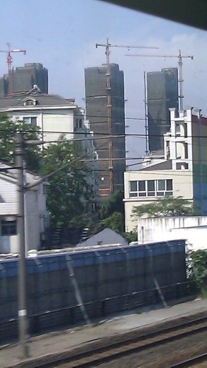 Notice the green safety netting over the scaffolding.