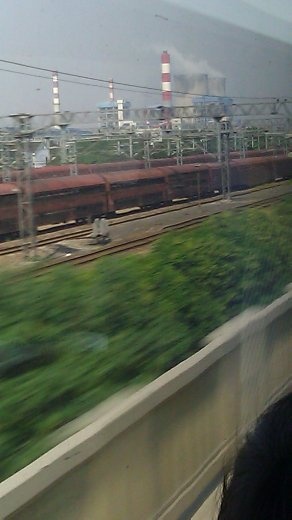 Nuclear plant with two cooling towers