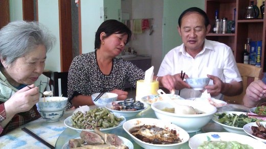 Gloria's grandmother, her caregiver and caregiver's husband