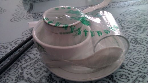 08 October, Lunch - The place setting comes wrapped from the dishwashing service.