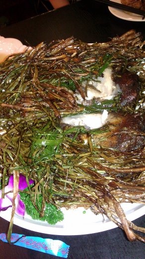 29 September, Dinner - Fish hidden in green onions.  The onions are crispy and the fish is tender.