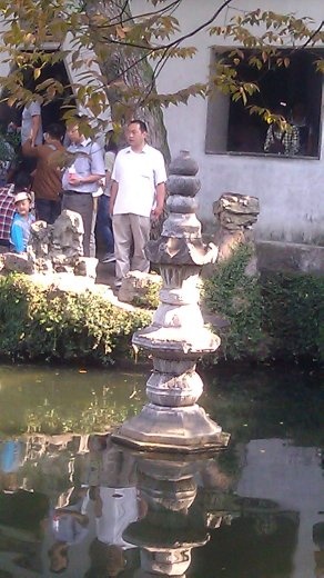Lingering Garden - Stupa in the central pool to prevent spirits from drowning family and guests