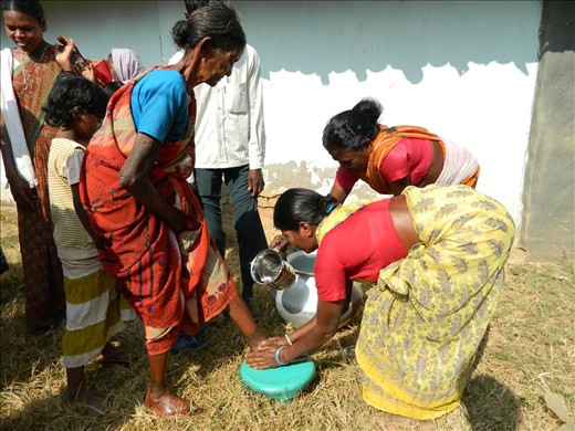 Feet wash, a tradition to wash the Feet of  Guest. from boy side