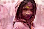 Children are always happy with colors. She came out of the crowd and looked straight at me. Holi festival in Pushkar, India. : by emildimitrov, Views[542]