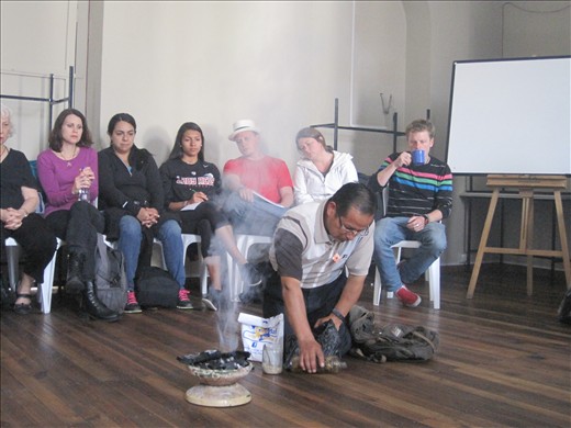 The healer setting up his materials 
