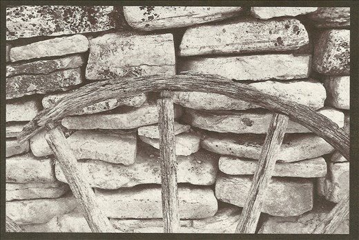 Salted Print of a broken wheel resting along a stone wall in the historic town.

*Note: This image was a digital file that I converted into a digital negative to complete in the alternative processes: Salted printing.