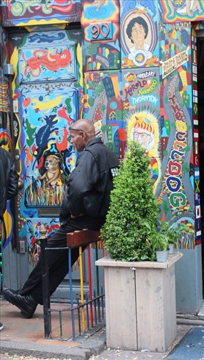 The slightly forbidding security guard at an over 18 location.