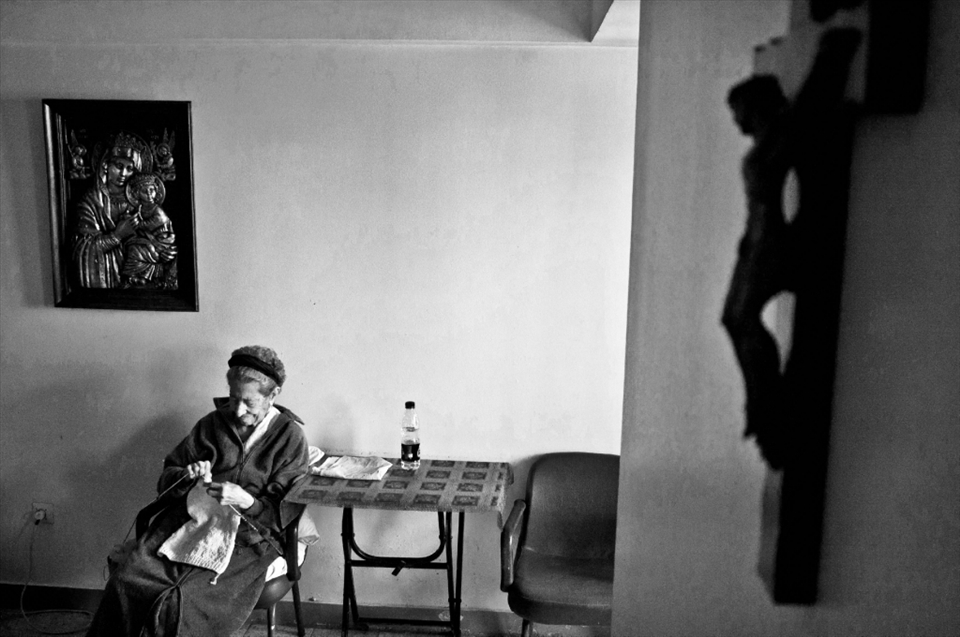 Nelly, the woman who made her way from secretariate the managerial board, speaks five languages, and used to write in short-hand. Now, all she's left with are knitting, and her squeky plea to God.