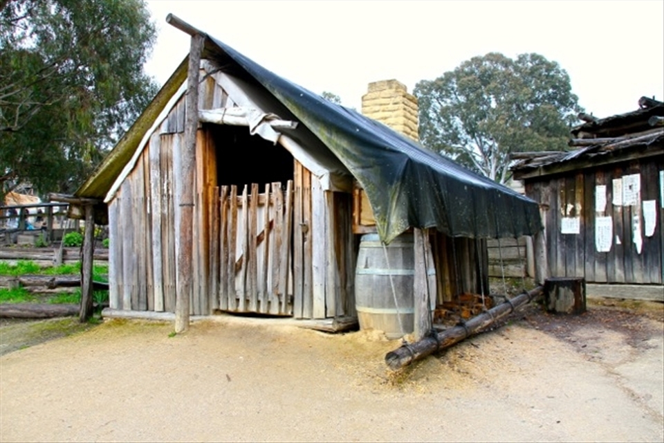 This fine little cottage reminds me the old times. These were generally found in villages with the kitchen smoke coming  
out the chimney.