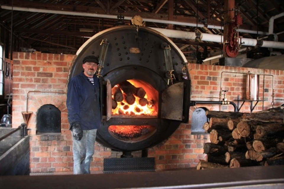 Looking at these people and the steam boilers it feels like the world never changed. 