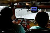 View from the jeepney´s cockpit. Note that the jeepney´s body design is taken from the American military jeep, its engine and parts are taken from discarded Japanese trucks, and its interiors are adorned with religious images ---  influences from nations that occupied the Philippines in the past. (Spain, US, and Japan): by enplim, Views[1584]