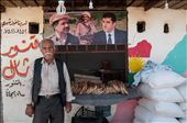 People try to go on with their lives and do what they did before escaping from their villages. This man is 72 years old and left Syria at a sudden with his son. They had a bakery  that has been destroyed and they have now arranged their new shop in an emergency building, decorated with a painting of the Kurdish flag  and the picture of Masoud Barzani, the founder of the democratic Party of Kurdistan and President of the Kurdish Autonomous Region of Iraq. He gives pitas, the local bread, for free to all refugees who cannot afford to pay for it.: by enrica, Views[438]