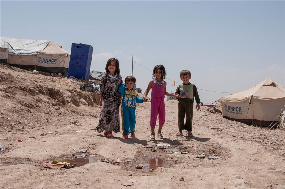 There always seems to be some solidarity among children: in sharing toys, in playing together. In a playground that is more likely to be hell, walking together hand in hand is a safe way to discover this new world.