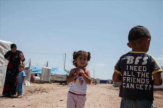 Everything is needed here: the T-shirt of this boy screams out loud the message you can read on each single yard of the camp, a place where nothing is really everything.