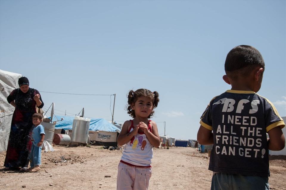 Everything is needed here: the T-shirt of this boy screams out loud the message you can read on each single yard of the camp, a place where nothing is really everything.