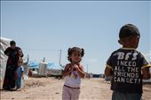 Everything is needed here: the T-shirt of this boy screams out loud the message you can read on each single yard of the camp, a place where nothing is really everything.: by enrica, Views[358]
