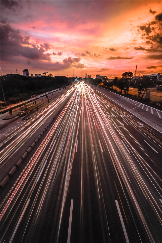 The widest road with 10 lanes per side shows an epitome of the rush hour. 