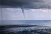 The funnel grows in length and width, stretching from the clouds down towards the point where the Tasman Sea and Pacific Ocean meet. Our group decides it's time to hightail it back to the bus.: by ericaannmeyer, Views[200]