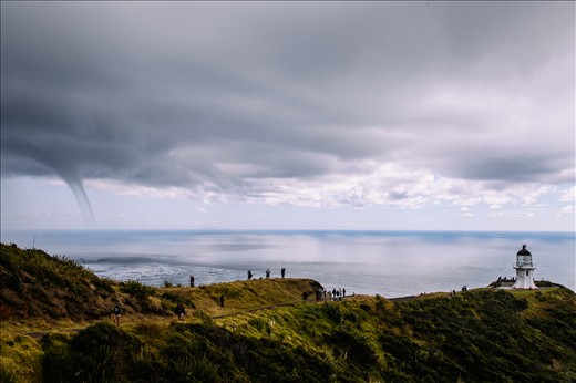 As we climb up the big hill, we can't help glancing back every few moments to check the intensity of storm. It peters out by the time we reach the bus, but we are exhilarated from our near brush with a tropical storm.
