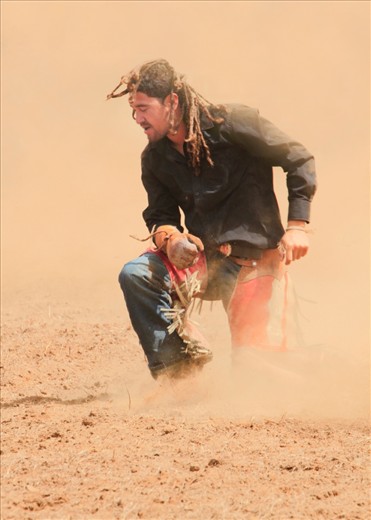Disappointment for this cowboy as he was bucked off the bull he was riding too early to qualify for any points. 