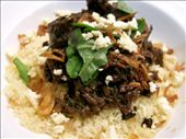 Lamb adobo, plated and served with feta, fried onions and basil over couscous.: by ericaparedes, Views[1001]