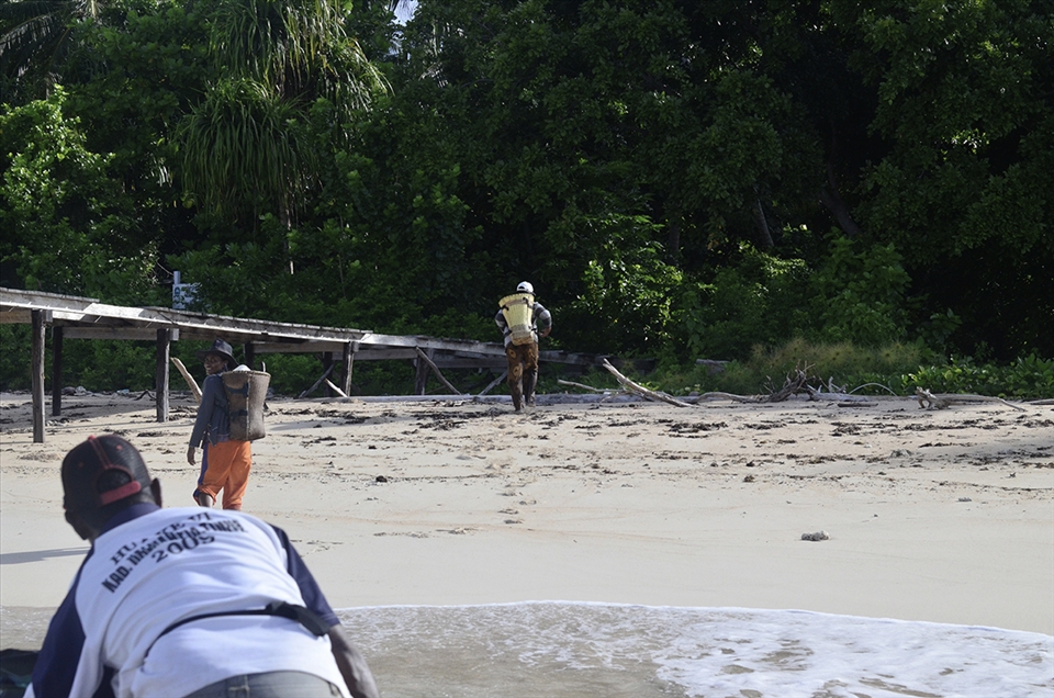 In this village everybody co-operated to survive, some went harvesting coconuts