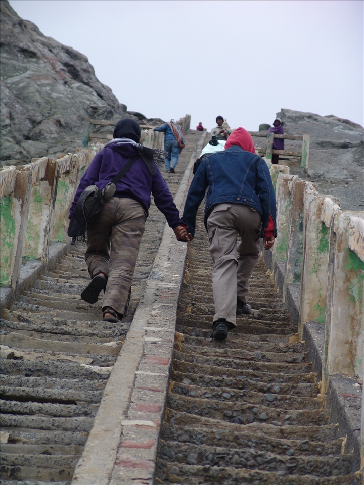 Holding hand together until they reach the peak defeating 250 steps of the stair