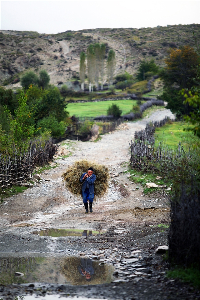 Lahij (other spellings Lagich, Lahich, and Lahic) (Azerbaijani: Lahıc) is a village and municipality on the southern slopes of Greater Caucasus within the Ismailli Rayon of Azerbaijan. Population is approximately 860 people who speak the variation of Tati - Lahiji language.
Lahij is a notable place in Azerbaijan, with its authentic handicrafts traditions, particularly related to copper. The village's carpet and rug crafts are also well known in Azerbaijan and the South Caucasus. Lahij has an old sewage system (some experts claim that it was built 1000 – 1500 years ago). Due to frequent earthquakes local people have developed sophisticated and authentic construction techniques.



Lahij is one of the most ancient human settlements in Azerbaijan. The Lahij District is located in the Ismayilli region[3] of the Republic of Azerbaijan, on the southern slopes of the Greater Caucasus Mountain Range at a height of 1211 meters above sea level.[4]
The majority of the population of Lahij speaks the Lahiji language.[5] The residents of the region are usually bilingual: as well as the Lahiji language, related to the Iranian language group, the Azerbaijani language is also widely spoken.
Being situated on the left bank of the River Ghirdiman and the slopes of the Niyal Mountain Chain, the settlement of Lahij is a unique living district, with its unusual planning lay out, transport systems, and its public, private and religious buildings. Lahij is an example of early urbanization and architecture, as shown by its cobbled streets and squares, together with its developed sewerage systems and water pipelines. Subterranean kurabandis (‘sewerage system’), made from river stones, and dating back to almost one thousand years, are thought to be one of the most ancient sewerage systems used in the world.[6]
The residents of Lahij are divided into three categories, based on their craftsmanship: Baadvan, Azavarro and Araghird.[7] Each of these categories has its own village square, mosque, hammam and graveyard. One of the most striking features of the urban look of Lahij, is the village square of each category, which, today, still has its specific role in the public life of the village.
Earthquakes frequently occur in the region, and, as a result, a specific style of building construction has developed – which include certain styles and techniques in crosscutting stone and installation of wood. The ancient dwelling houses in Lahij have remained unchanged, as, during the past centuries, there have not been any significant changes in the urban planning. The ground floors of houses built in the main trading street are used as workshops and trade rooms. The traditional interiors of these Lahij houses include decorative tableware and other items, placed in different sized holes in the walls (known in Azerbaijan as takhcha, chamakhatan) and on wall shelves.
During the Medieval Period, Lahij became an important centre of craftsmen in Azerbaijan. Lahij master craftsmen could create forty types of items related to Folk Art.[8] These skilled craftsmen included jewelers, blacksmiths, carpenters, carpet makers, engravers, painters, tanners, shoemakers and bast shoe makers, sock weavers and others. Many valuable examples of the products of these skills are exhibited in famous museums and collections.
Copper work is the most important of the skills developed by Lahij craftsmen. Lahij is renowned for its production of arms and copper items, decorated with carved ornaments. The development of copper production triggered the formation of such professions in Lahij as tinsmith, blacksmith and others, together with the creation of bituminous coal. The structure and supplies of copper workshops, as well as its traditional external look and its production processes remain preserved today, as they were in previous centuries. Written sources,[9][10][11] as well as, the rich copperware collections that may be seen in the museums of Azerbaijan, Georgia, Russian and Europe, prove the existence of over 80 types of copperware equipment used in copperware manufacturing in Lahij.
Leather goods’ manufacture was the second biggest craft skill in Lahij, after that of coppersmith. The local leather goods’ master craftsmen were expert in using shagren, tumaj and yuft as raw materials for various products such as shoes, belts, leather quilted jackets, book covers and bridles. Leather production in Lahij created suitable conditions for the development of other craftsmen, with associated skills - such as saddle makers, bridle makers, cobblers, hat makers and sheepskin makers.
There is a large collection of Lahij products in the Azerbaijan Museum of National History, which reflects the many different and richly made items produced by the Lahij craftsmen. Many similar items are also to be found in the Russian Museum of Ethnography (Saint-Petersburg) and the Museum of Eastern Peoples (Moscow). The Louvre Museum in France also has a collection of items from Azerbaijan, which include a copper pot manufactured in Lahij. The Museum of Bern has a collection of firearms and weapons of cold steel, manufactured in Azerbaijan, which includes rifles, swords and sabres, richly decorated with ornamental patterns and inlaid work.[12]
The major part of the cultural heritage of the Lahij represents interpretations of Islam, as well as folk rites, traditions, ceremonies and celebrations related to pre-Islamic faiths. Included within this heritage are the intercultural and inter-religious communications that were understood by the then peoples of Lahij.
The development of international tourism, together with more knowledge about the people and cultures, has resulted in a gradual interest in the cultural diversity of the Region. Lahij, in recent years, has attracted the attention of many tourists visiting from countries worldwide and as a result Lahij is now included in the travel tours of several leading tourism agencies.
Lahij, due to its unique and original features, has, throughout its history, been a centre of gravity for writers, scholars, artists and filmmakers, and, today, the residents make considerable efforts to promote the Region’s cultural heritage. Manaf Suleymanov, the Azerbaijani writer and journalist, who was originally from Lahij, published a book, in 1994, entitled “Lahij: Ethnographic and artistic insight”. The natural and manmade beauties of the Region are reflected in the paintings by the talented Lahij artist – Agha Mehdiyev.
The interest of scholars in the heritage of Lahij has been always at the highest level, and both Azerbaijan and foreign experts have written research papers about this unique village.
Films about Lahij and its residents have been, and presently are, shown at international contests and film festivals. The film called “Emanet” (Heritage) directed in 2006, by filmmaker Shamil Najafzade,[13] is dedicated to the unique culture of Lahij and to the current problems faced by its people. “Lahij Pace” (2008) directed by Fariz Ahmadov, was included in the competition at the Irpen Film Festival, which was held in Ukraine, and also at the 39th International Rushd Film Festival of Iran. This film received a prize and diploma at the Second International Festival – Turfilm-Riga-2009[14] - which is dedicated to films about tourism.
Both the State of Azerbaijan and the Lahij Community make continued and considerable efforts to preserve Lahij’s unique culture, applied arts and traditional system of arranging handicraft production, together with ensuring cooperation within both Lahij’s community and its neighbours.
Lahij was proclaimed a historical and cultural reserve by the decision dated 23 December 1980 of the Soviet of Ministers of Azerbaijan