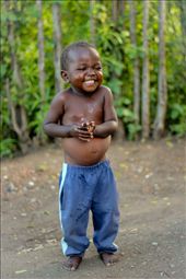 After covering himself with mango juice, he loved a water fight in the hot afternoon sun.: by etravel, Views[493]