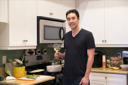 Eugene Cooking the Asparagus Risotto with Pan-Seared Shrimp