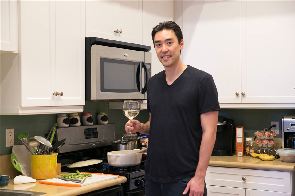 Eugene Cooking the Asparagus Risotto with Pan-Seared Shrimp